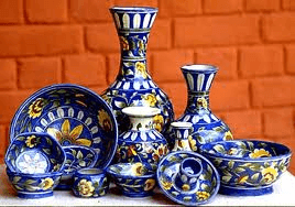 Assortment of Jaipur blue pottery with cobalt floral motifs